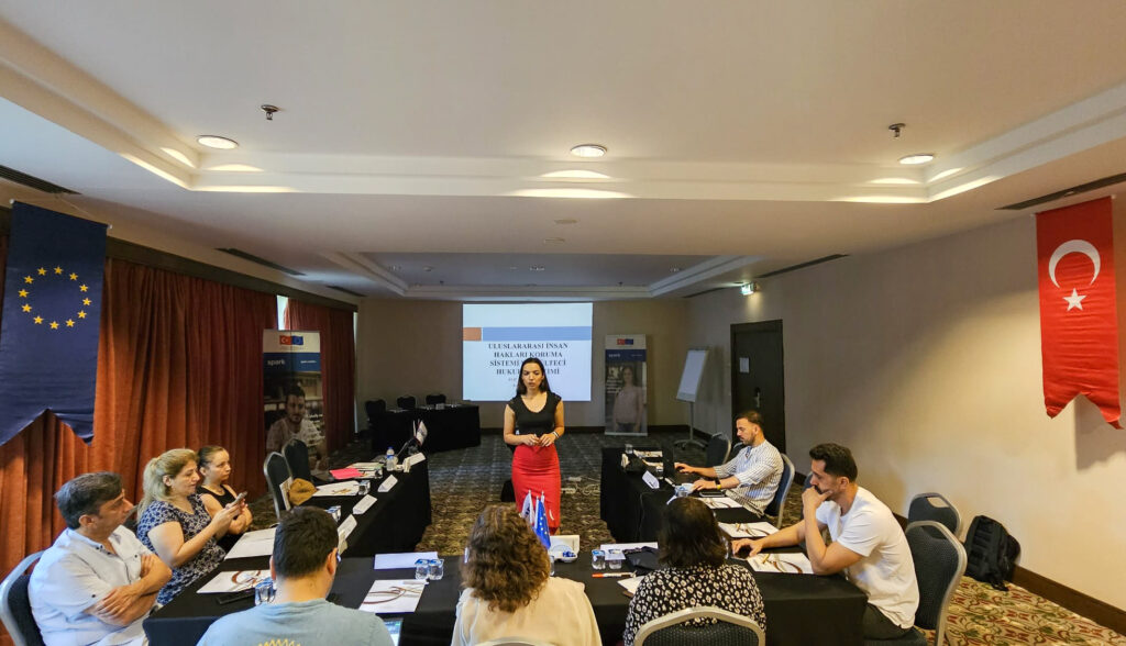 Attorney Ecem Doğru and the trainees from partner universities at the programme